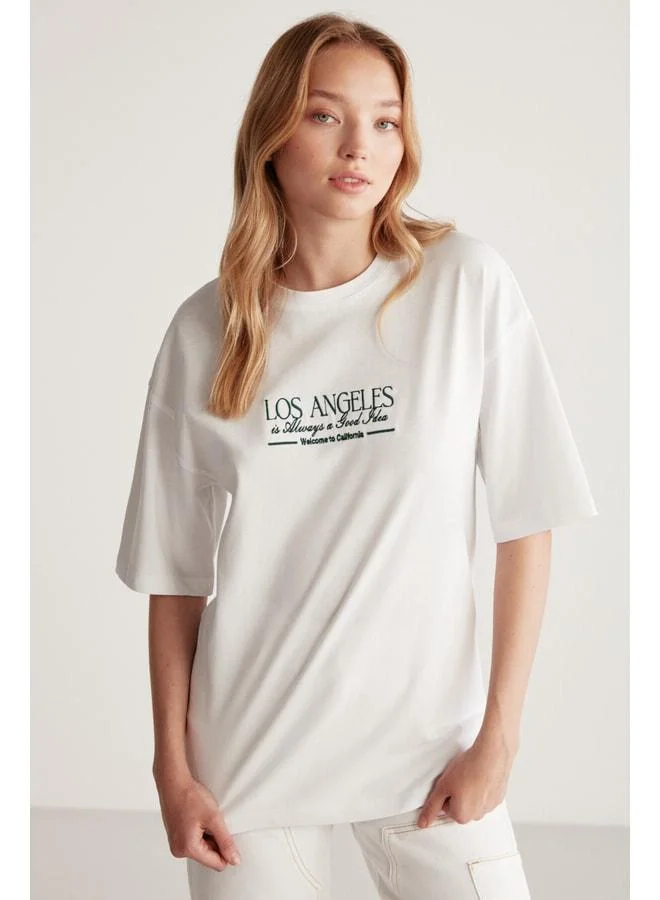 GRIMELANGE Janna Women's City-Themed Front and Back Print Detailed Oversize Fit Bike Neck White/Green T‑shirt.