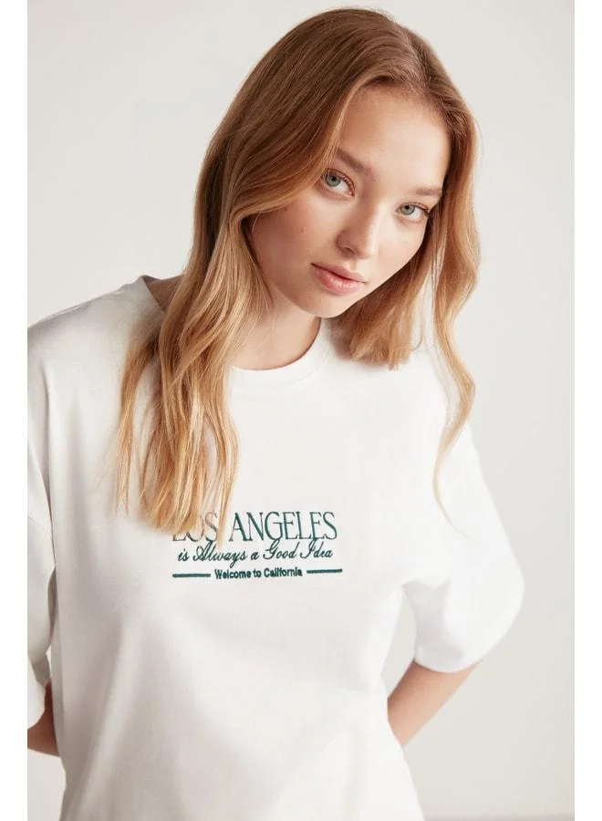 GRIMELANGE Janna Women's City-Themed Front and Back Print Detailed Oversize Fit Bike Neck White/Green T‑shirt.