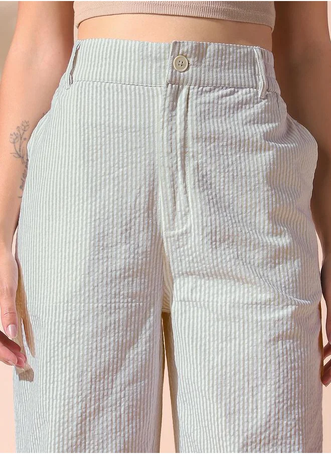 Dennis Lingo Women sage green loose fit striped cotton blend trousers with button closure- tailored to elevate your everyday.