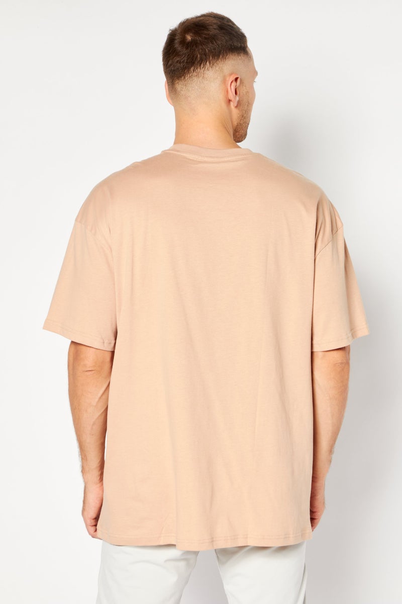 PUMA Men Sportswear Fit Brand Logo Training T Shirt, Tan - Image 2