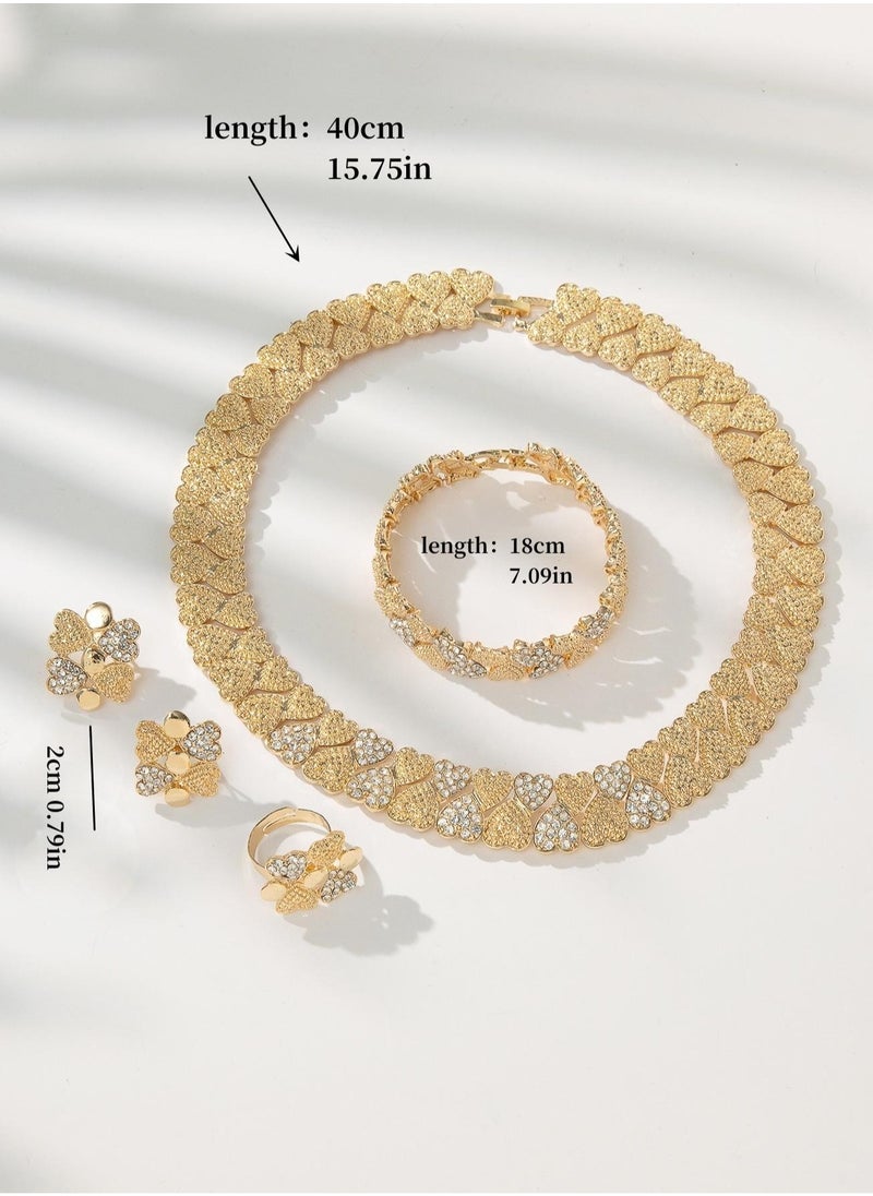 ماركة غير محددة - اكسسوار نسائي طقم مكون من 4 قطع يحتوي على سلسال, اقراط, خاتم و سوار بتصميم قلب يدمج بين اللونين الذهبي والفضي مقاوم للصدأ - Image 1