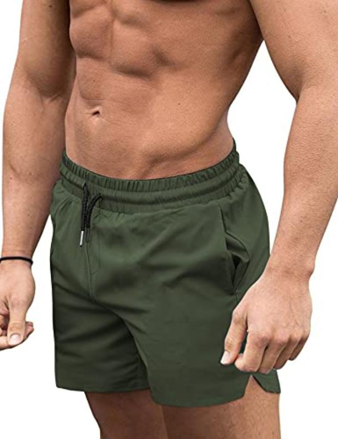 شورت سباحة رجالي للشاطئ، سريع الجفاف وخفيف الوزن، مناسب للسباحة في المسبح والبحر، مصنوع من مزيج البوليستر والإيلاستين. - Image 1