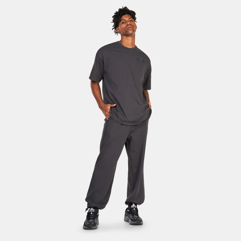 PUMA Men's Classics RE:ESCAPE Sweatpants
