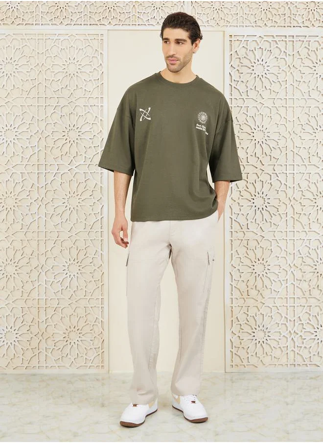 ستايلي Front & Back Graphic Print Interlock Boxy T-Shirt