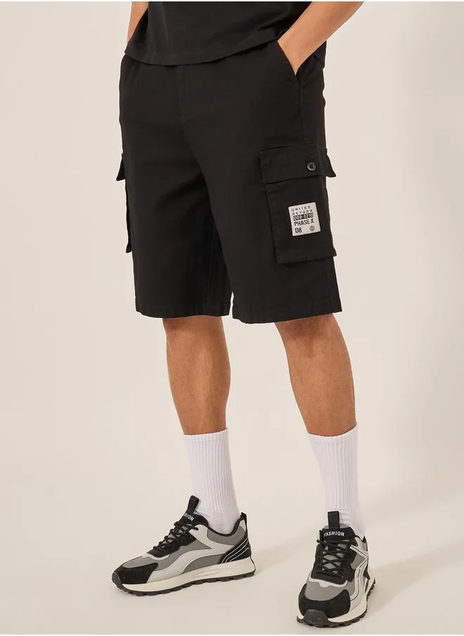 ستايلي Rip Stop Cargo Oversized Shorts with Pocket Badge Detail