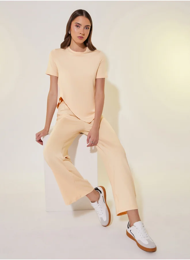 Styli Asymmetrical Hem Short Sleeve T-Shirt and Pants Co-Ords