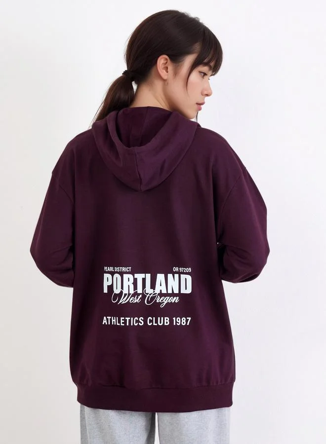 Styli Styli Purple Longline Hoodie with Slogan Print