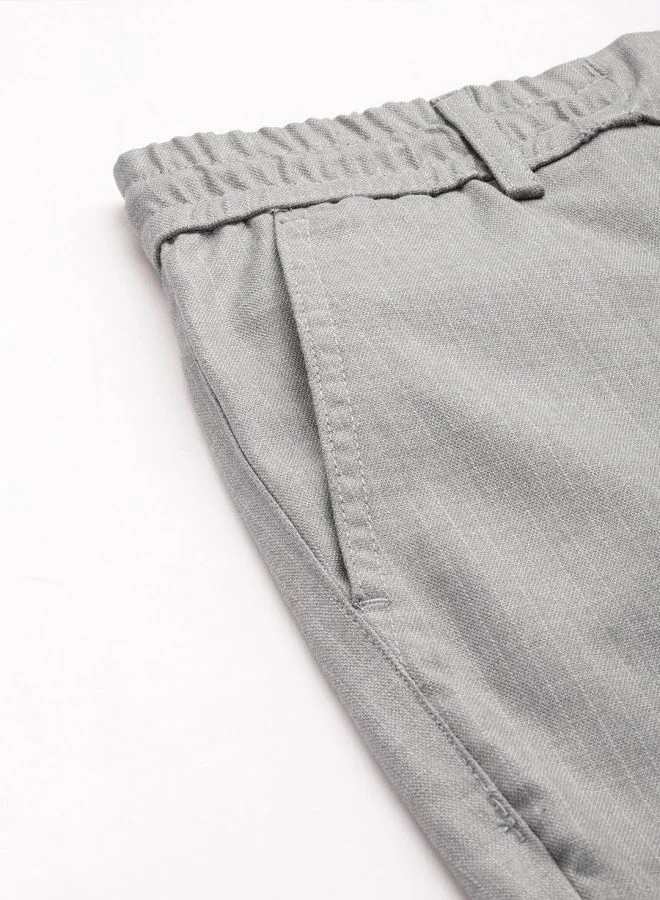 شركة المرآب الهندية Men Regular Fit Self Design Mid-Rise Stretchable Jogger Trousers