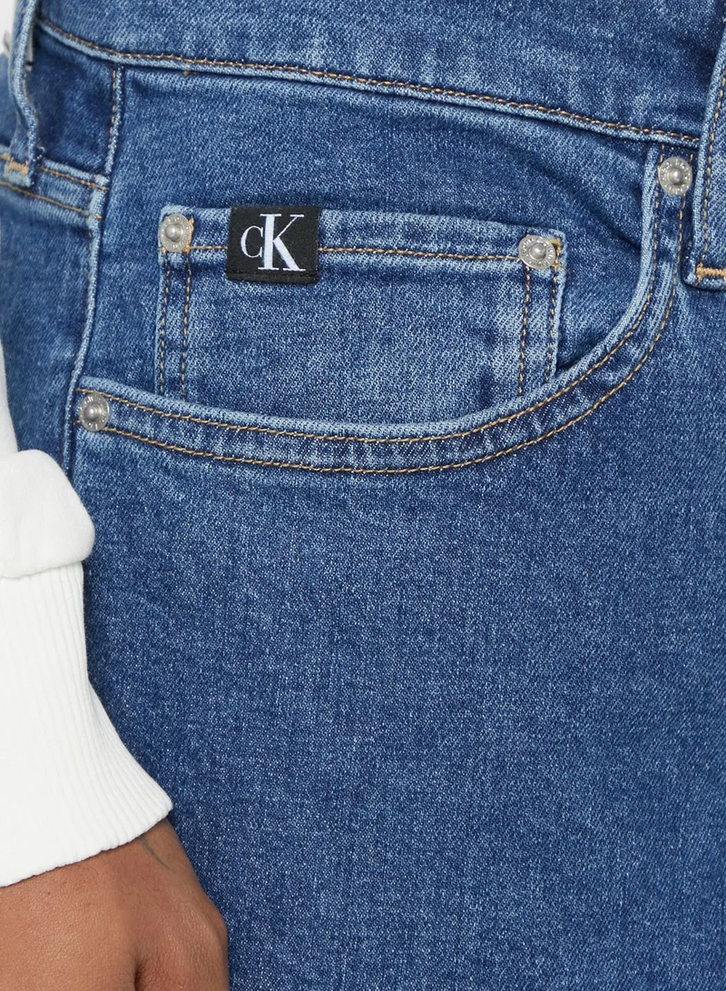 CALVIN KLEIN Mid Wash Tapered Fit Jeans