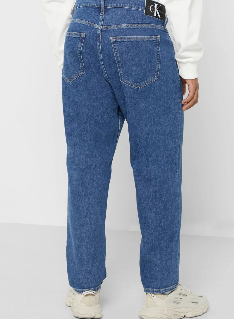CALVIN KLEIN Mid Wash Tapered Fit Jeans