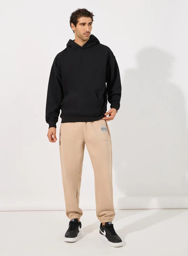 ستايلي هودي فضفاض مطبع بطبعة جرافيك