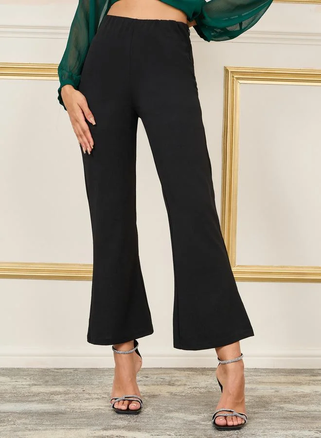 ستايلي Beaded Detail Layer Peplum Top and Solid Bootcut Co-ords