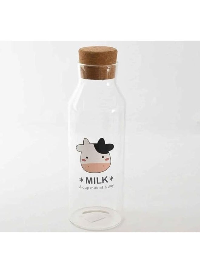 زجاجة لبن أنيقة مصنوعة من زجاج شفاف متين، مصممة لحفظ وتقديم الحليب والمشروبات بطريقة عملية وأنيقة. تأتي مع غطاء فلين طبيعي يساعد على إغلاق الزجاجة بشكل جيد والحفاظ على نضارة المشروب. - Image 1
