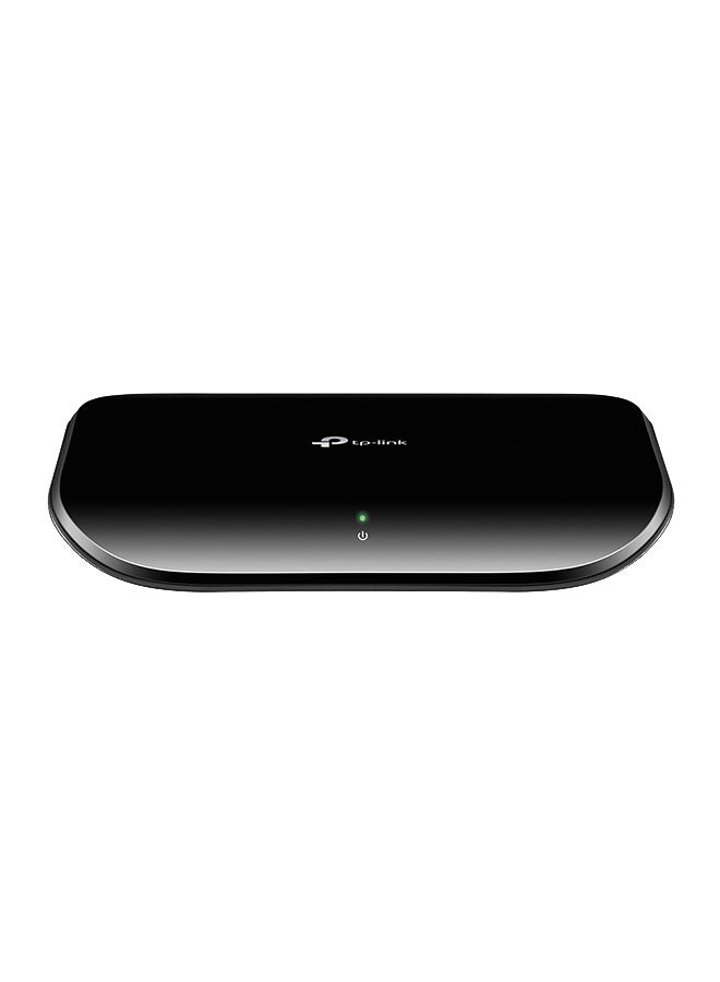 تي بي لينك محول شبكة إيثرنت TL-SG1005D ب5 منافذ جيجابت إيثرنت، بخاصية التوصيل والتشغيل، سطح المكتب أو الحائط، مقسم غطاء بلاستيكي، بدون مروحة، تحسين حركة المرور، غير مدار متعدد الألوان - Image 1