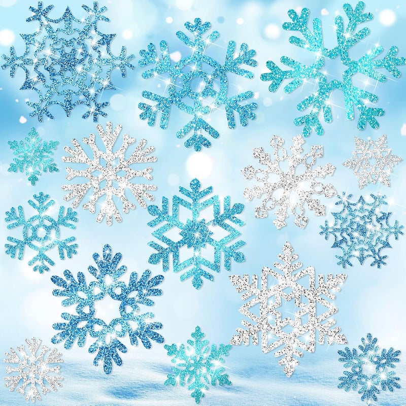 klarako 90 Pcs Snowflake Cutouts Decorations, Winter Paper Snowflake Cutouts with Glue Stickers for Bulletin Board Christmas Party Home Class Office Decor Accessories(Silver, Blue) - Image 1