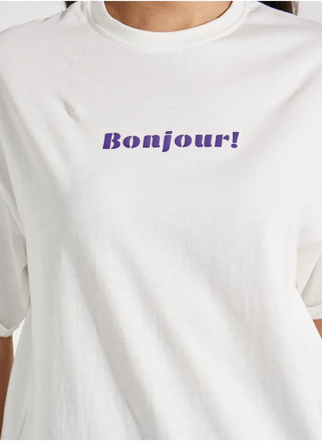 ستايلي Oversized Bonjour Print Turn-Up Sleeves T-Shirt