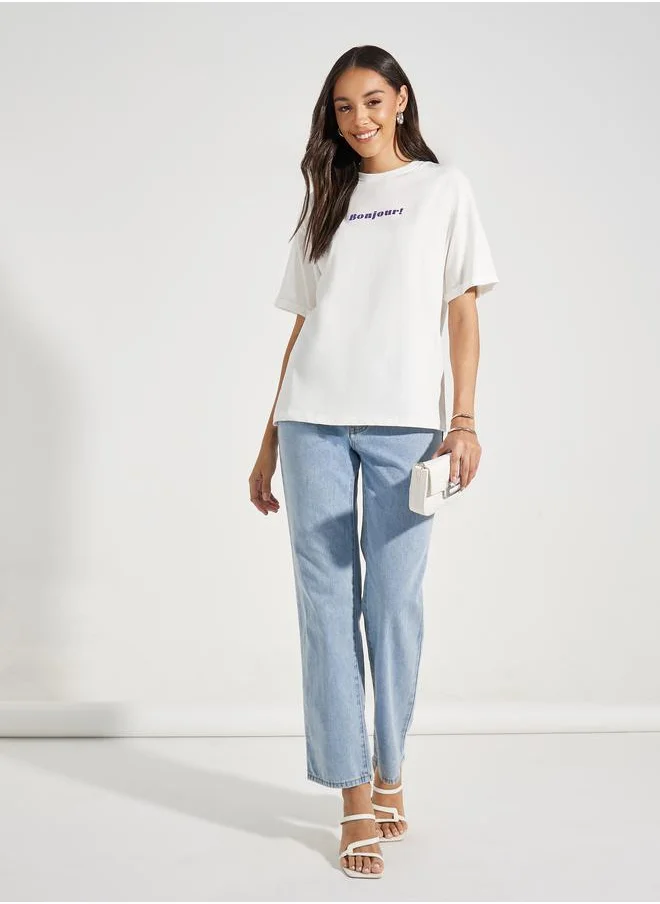 ستايلي Oversized Bonjour Print Turn-Up Sleeves T-Shirt