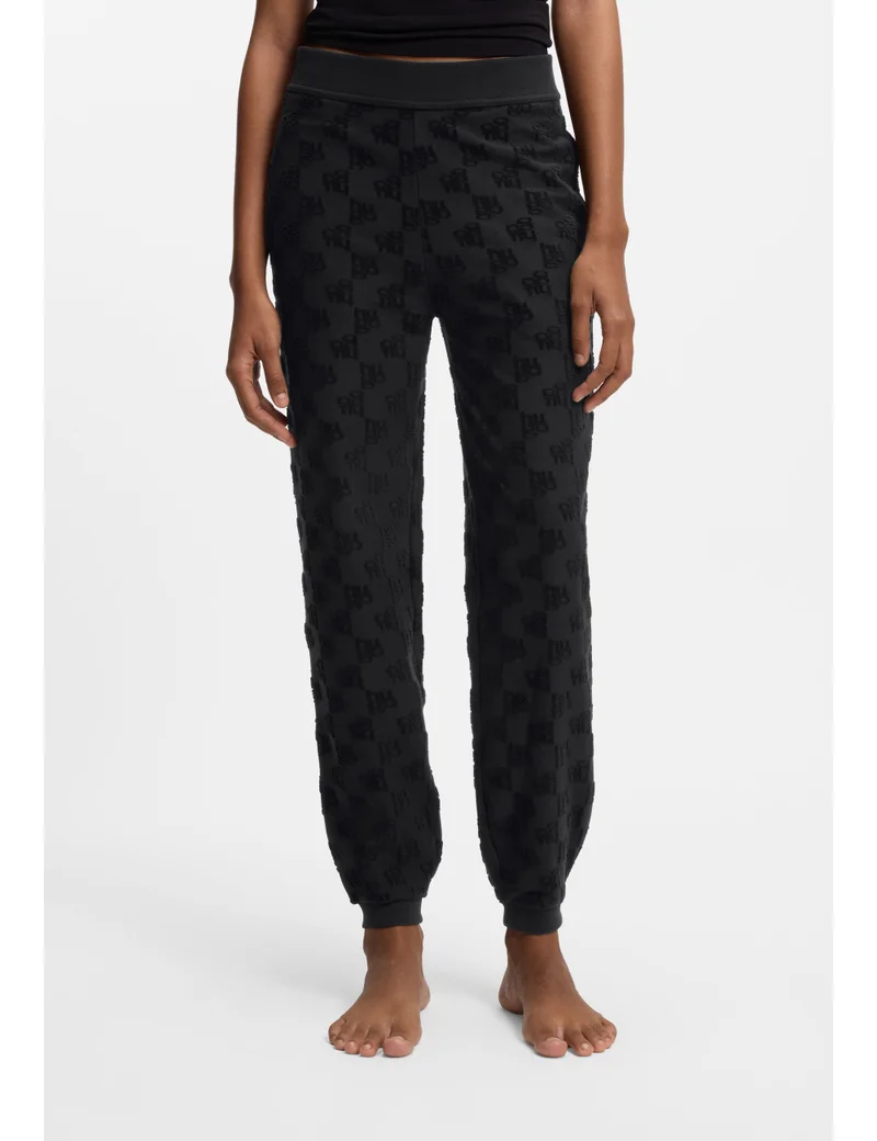 HUGO Cotton-blend tracksuit bottoms with all-over logo pattern