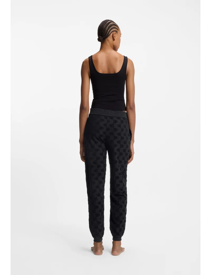 HUGO Cotton-blend tracksuit bottoms with all-over logo pattern
