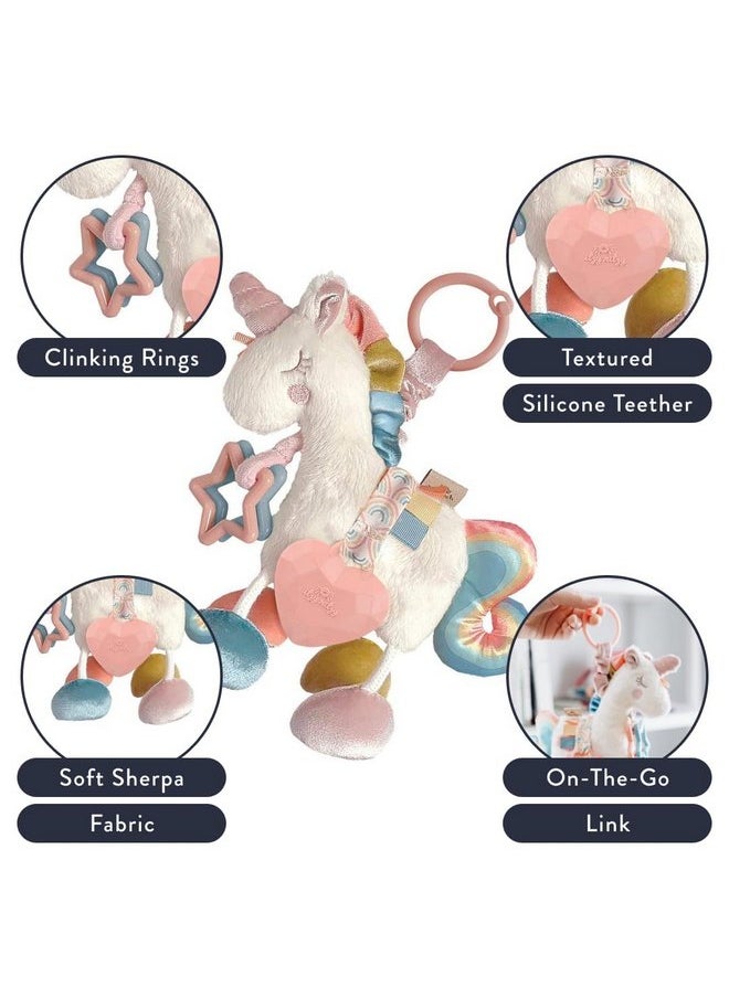 Itzy Ritzy - Itzy Ritzy Link & Love Toy for Stroller or Car Seat; Features Textured Ribbons, Crinkle Sounds, Clinking Rings & Silicone Teether; Designed For Ages 0 Months and Up (Unicorn) - Image 1