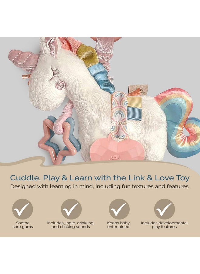 Itzy Ritzy - Itzy Ritzy Link & Love Toy for Stroller or Car Seat; Features Textured Ribbons, Crinkle Sounds, Clinking Rings & Silicone Teether; Designed For Ages 0 Months and Up (Unicorn) - Image 1
