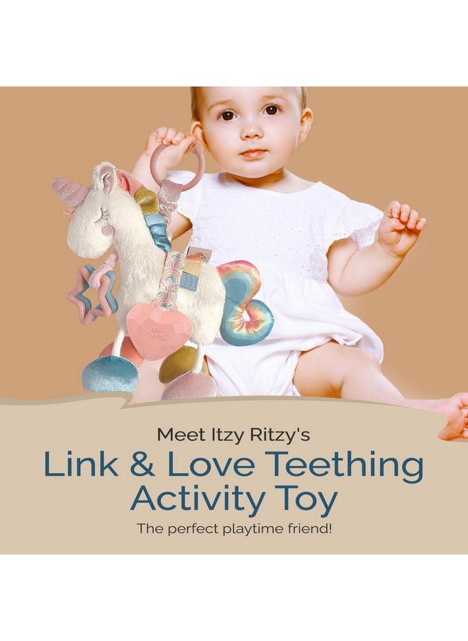 Itzy Ritzy - Itzy Ritzy Link & Love Toy for Stroller or Car Seat; Features Textured Ribbons, Crinkle Sounds, Clinking Rings & Silicone Teether; Designed For Ages 0 Months and Up (Unicorn) - Image 1