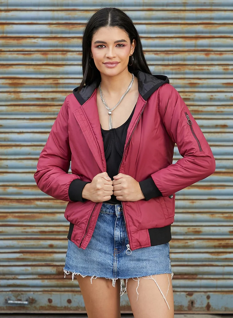 Campus Sutra Women's Cherry Red Zip-Front Jacket With Contrast Hem For Casual Wear | Hooded Neck  | Long Sleeve | Zipper Closure | Jacket Crafted With Comfort Fit For Everyday Wear