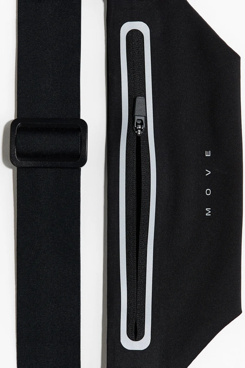 اتش اند ام حقيبة خصر للركض بتفاصيل عاكسة