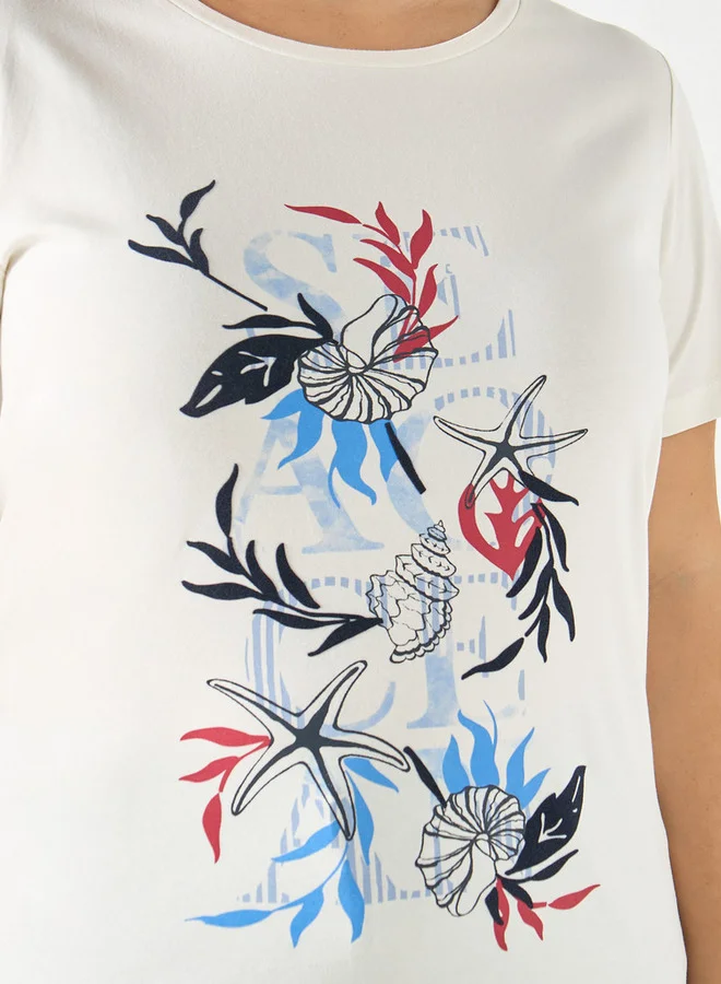 أولا بوبكن تيشيرت مقاس كبير بياقة مستديرة وأكمام قصيرة وطبعات من أولا بوبكين