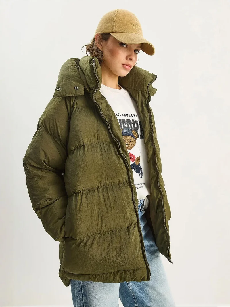 بيانكو لوتشي معطف منتفخ بغطاء رأس كبير الحجم من لوتشي