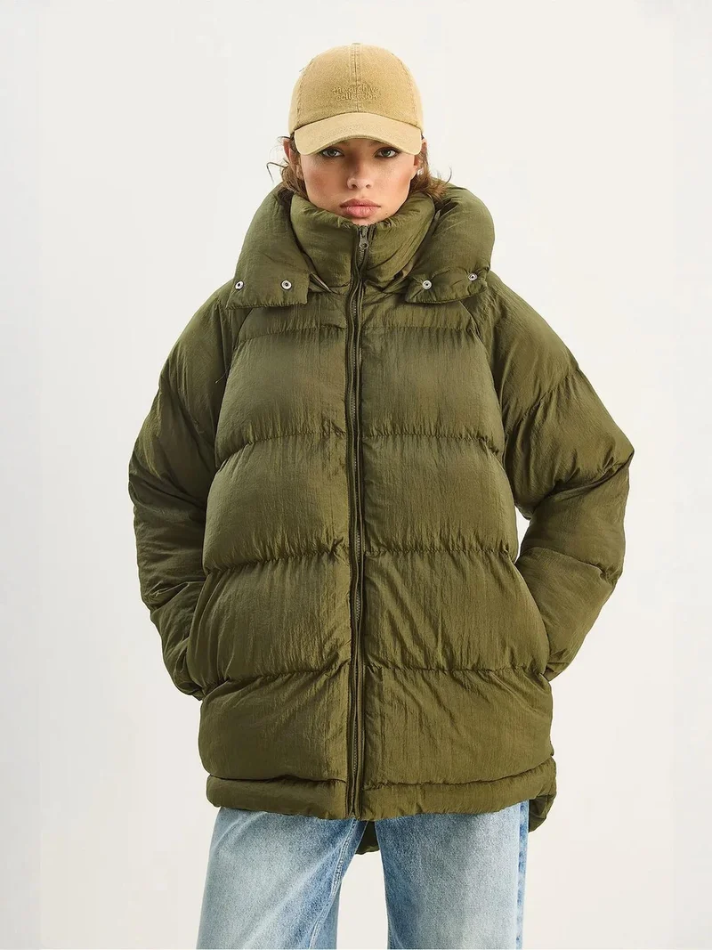 بيانكو لوتشي معطف منتفخ بغطاء رأس كبير الحجم من لوتشي