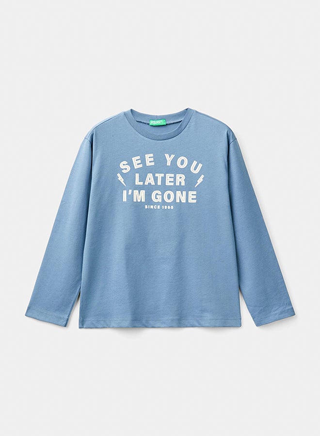 بينيتون تي شيرت للأولاد من القطن الدافئ مع طباعة أمامية وخلفية - Image 1