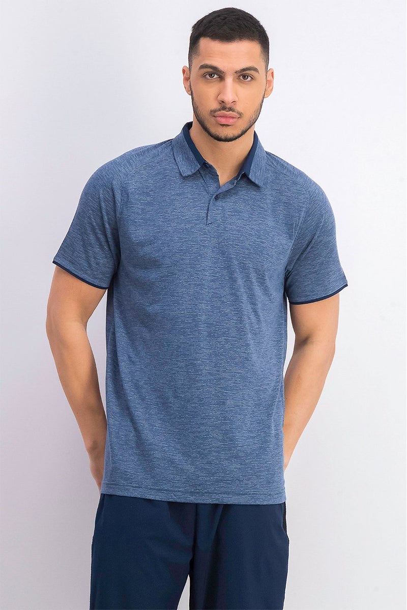 UNDER ARMOUR قميص بولو قصير الأكمام للرجال، أزرق شامبره - Image 1