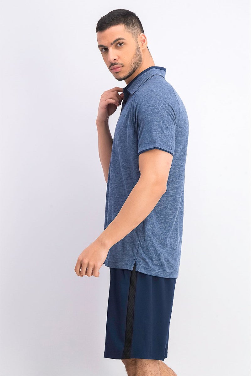 UNDER ARMOUR قميص بولو قصير الأكمام للرجال، أزرق شامبره - Image 3