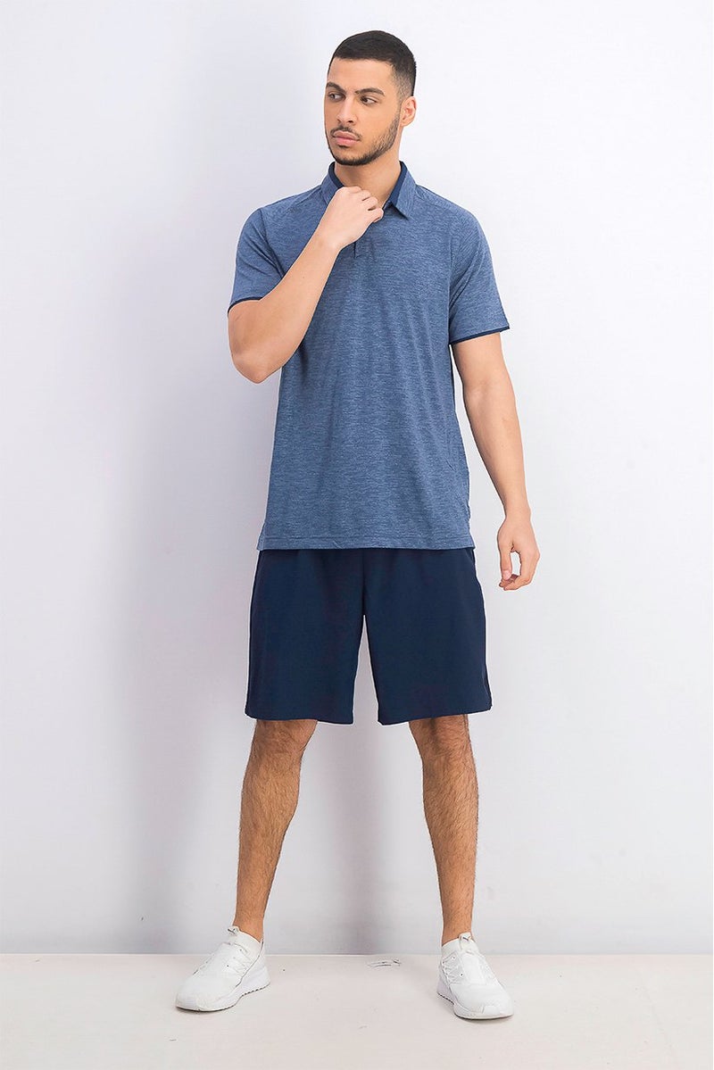 UNDER ARMOUR قميص بولو قصير الأكمام للرجال، أزرق شامبره - Image 2