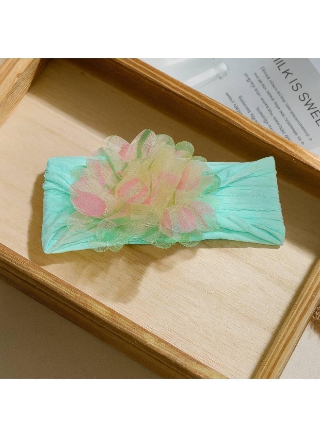 Kids fabric headband with a soft tulle flower, lightweight and comfortable, perfect for daily wear and special occasions. Available in multicolour. - Image 1