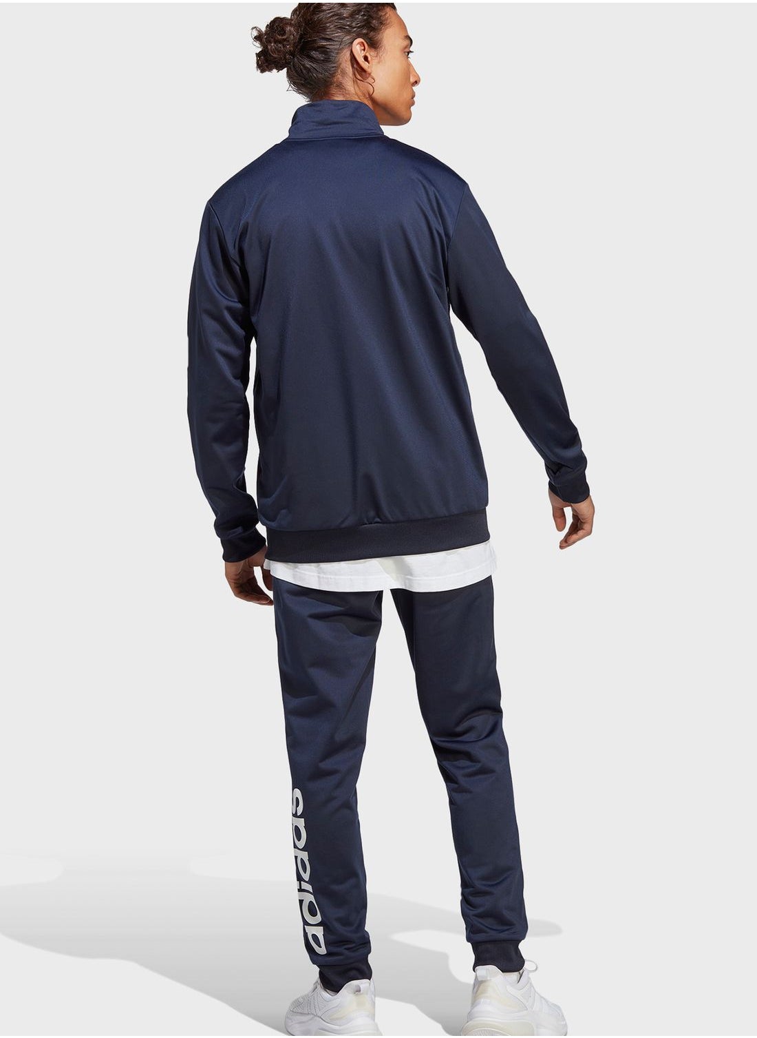 Linear Logo Tricot Tracksuit - https://f.nooncdn.com/p/pzsku/Z9B8DB8629DC02F19EAA0Z/45/_/1694807497/e2bf10c0-6adf-4c53-bee2-63455c57ac68.jpg?width=original