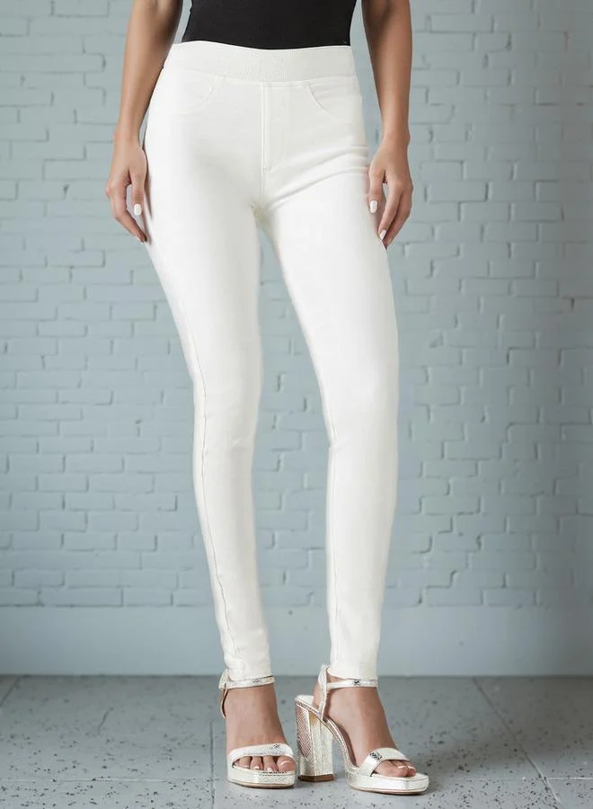 لي كوبر بنطلون جينز ضيّق سادة بخصر مطّاطي وجيوب من لي كوبر