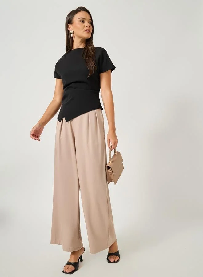 ستايلي بلوزة قصيرة بأكمام صلبة وحافة غير متماثلة