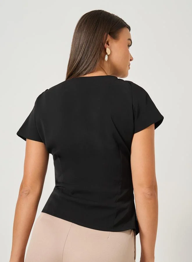 Styli Black Solid Short Sleeves Asymmetric Hem Top for Women | Best Price UAE