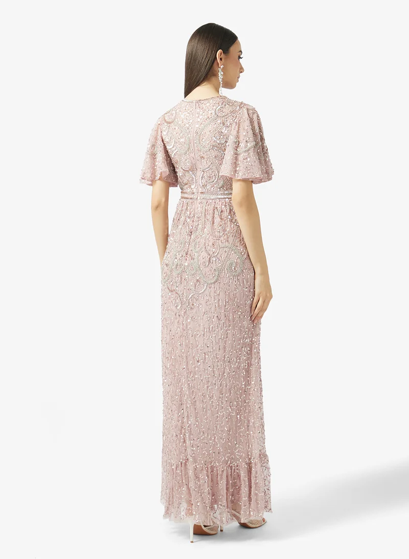 بيوت فستان ماكسي مزين بالترتر وأكمام الجرس