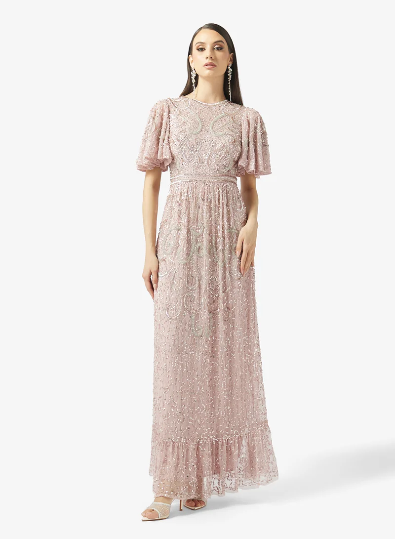 بيوت فستان ماكسي مزين بالترتر وأكمام الجرس