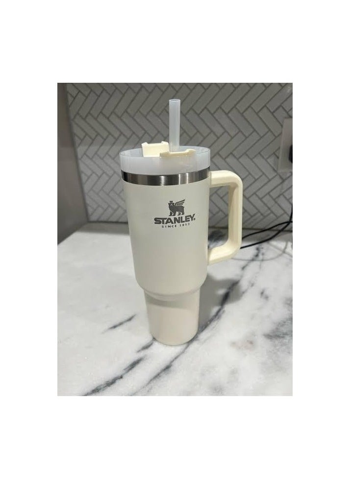 Stanley Stanley Quencher H2.0 FlowState Stainless Steel Vacuum Insulated Tumbler with Lid and Straw for Water, Iced Tea or Coffee, Smoothie and More Ivory - 40oz  - Image 1