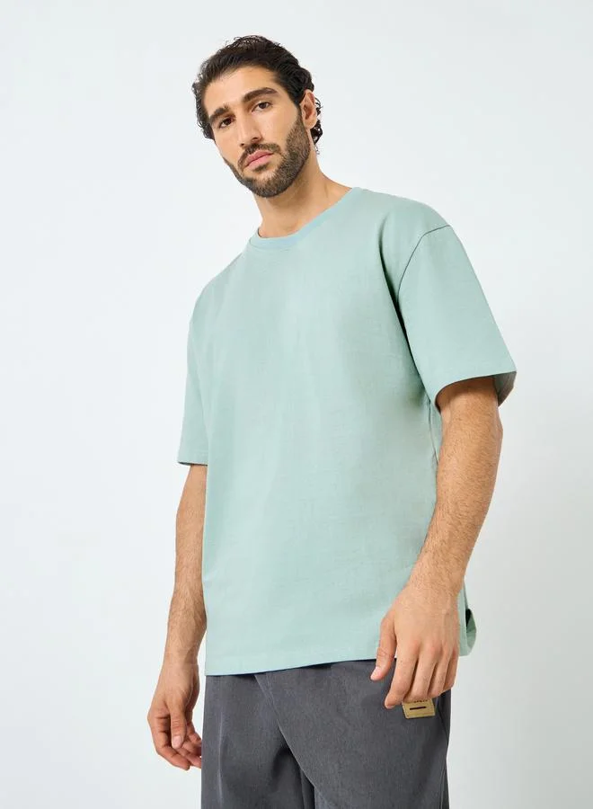 Styli Styli Men Oversized Minimal Typographic Back Graphic T-Shirt