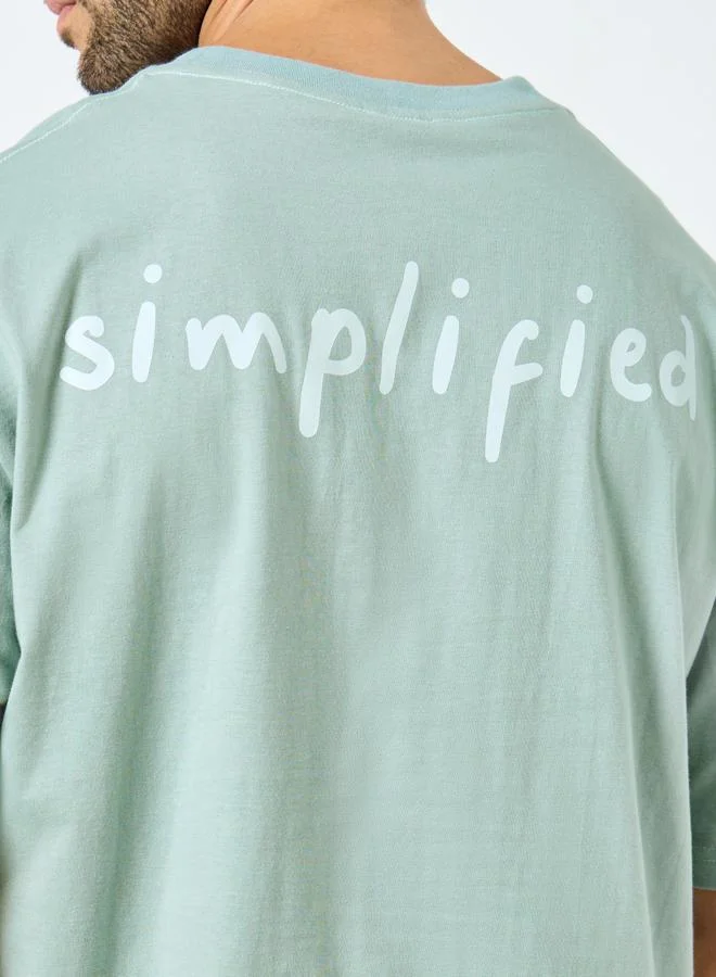 Styli Styli Men Oversized Minimal Typographic Back Graphic T-Shirt