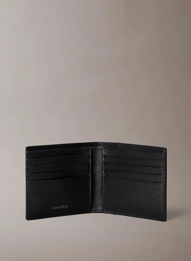 Calvin Klein Black Textured Emblem Plaque Billfold Wallet for Men | Best Price UAE