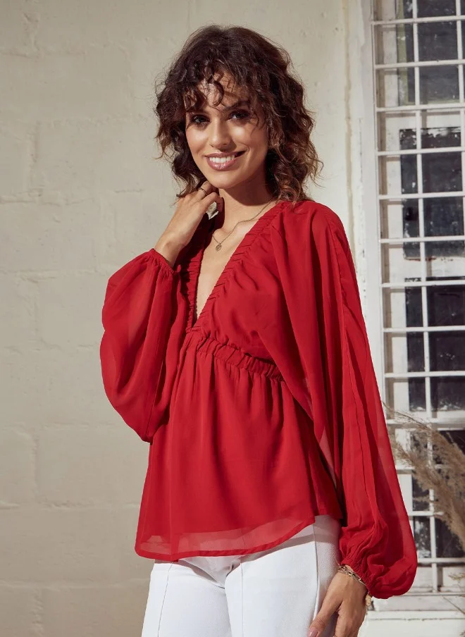 SASSAFRAS Red V-Neck Extended Sleeves Peplum Top for Women