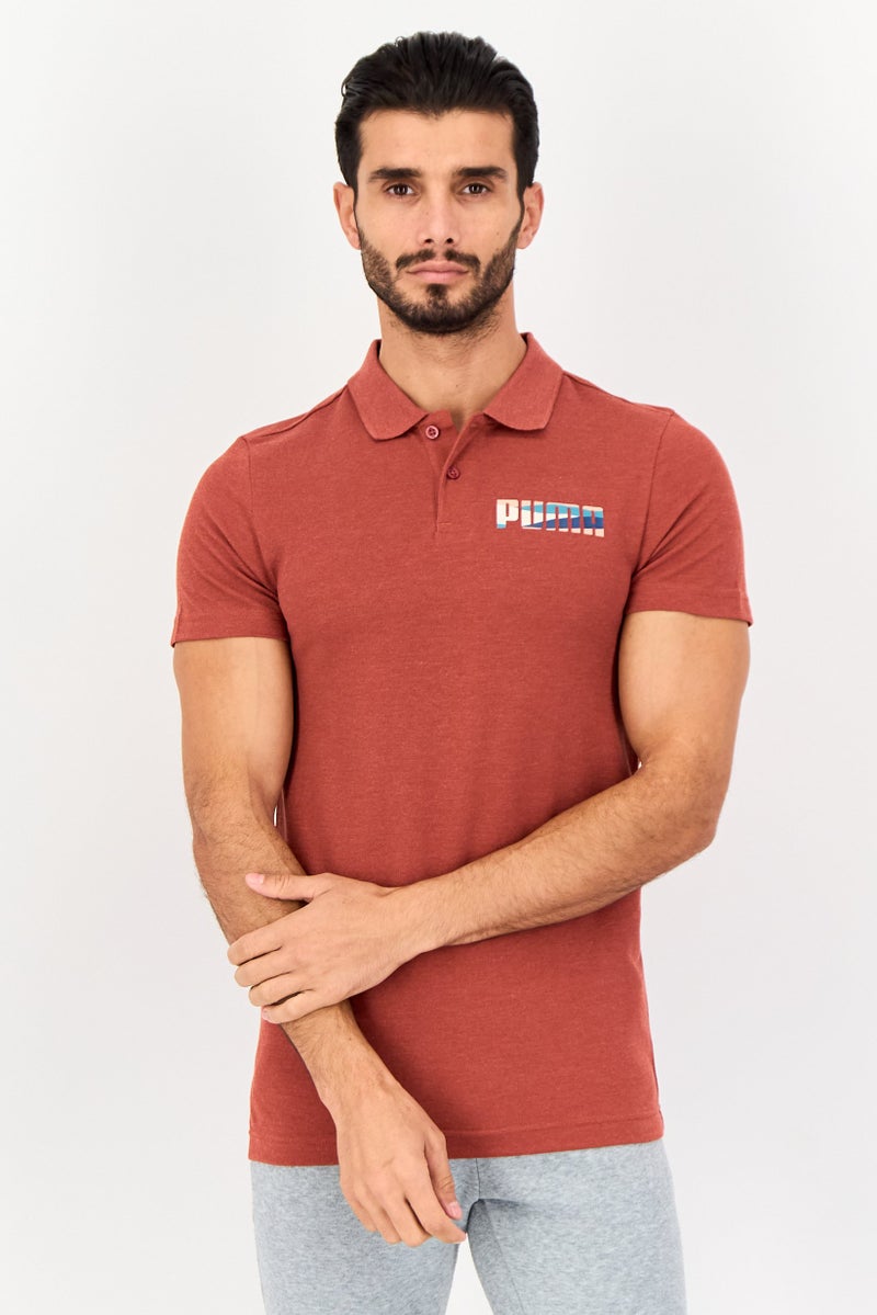 PUMA قميص بولو قصير الأكمام للرجال بتصميم ضيق مع شعار العلامة التجارية، أحمر حار - Image 1