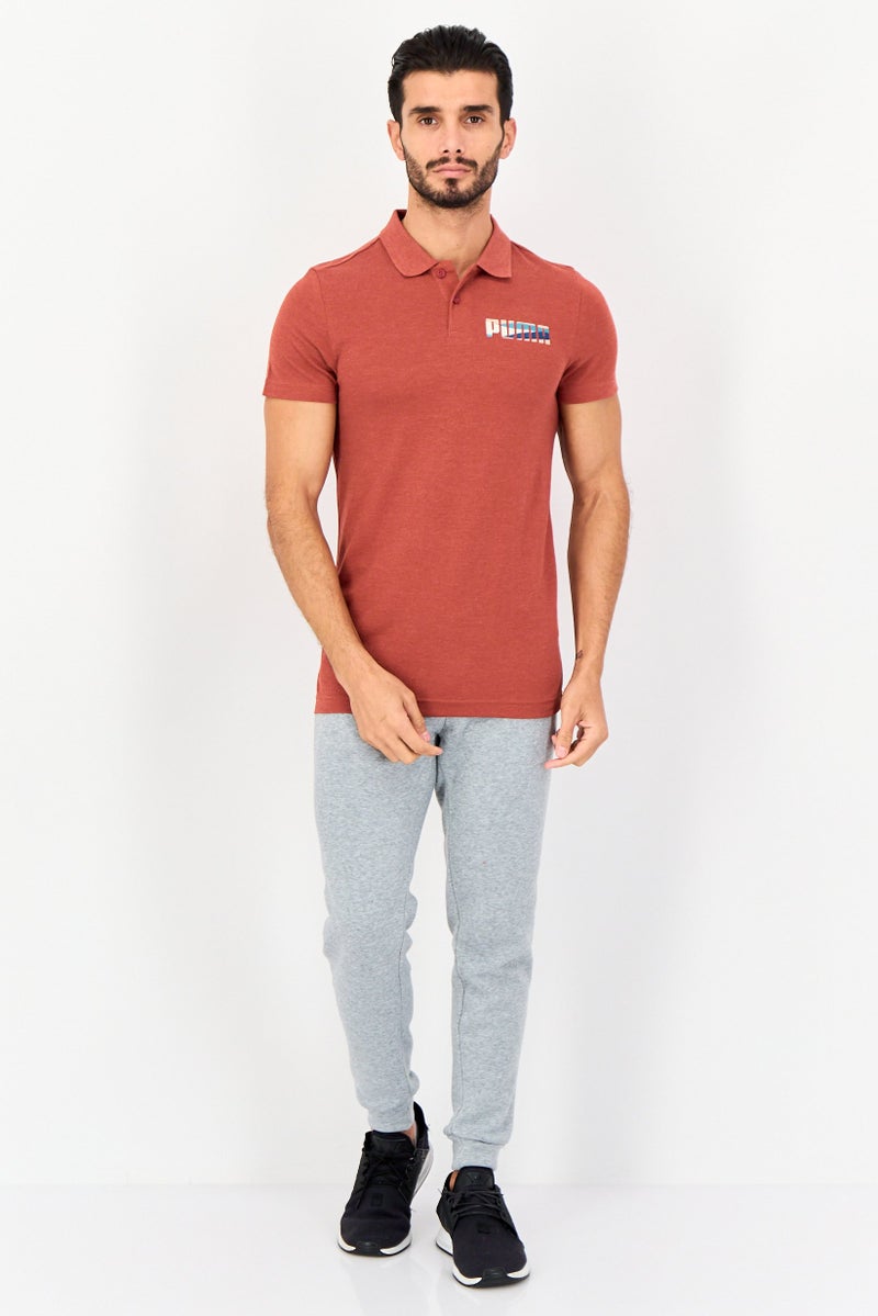 PUMA قميص بولو قصير الأكمام للرجال بتصميم ضيق مع شعار العلامة التجارية، أحمر حار - Image 2