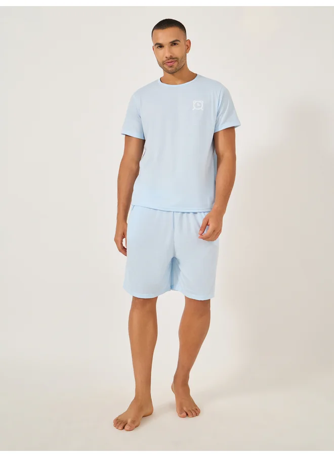 Styli Styli Unwind Slogan Front and Back Printed T-Shirt and Shorts Set